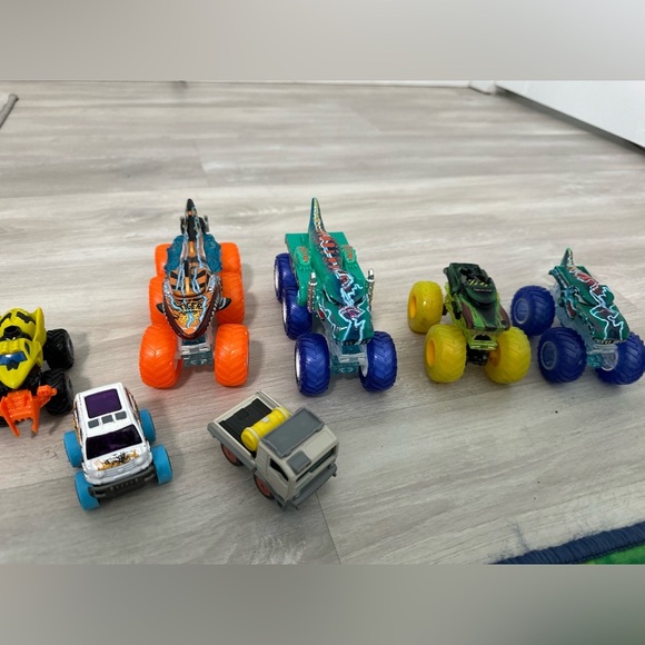 Monster Truck Toy cars with Orange, Blue, and Yellow Wheels set of 7 - Picture 1 of 5